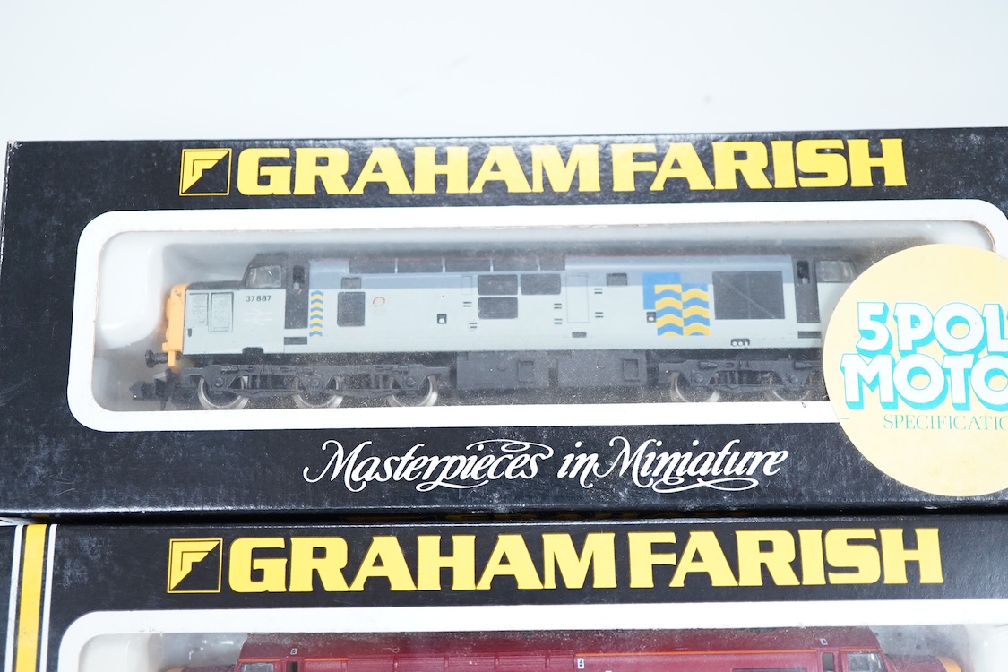 Four boxed Graham Farish N gauge railway Class 37 diesel locomotives; a BR Railfreight, 37 699 (8036), a BR Petroleum Sector, 37 887 (8037), a Mainline, 37055 (803D) and an EWS, 37408 (803E).
